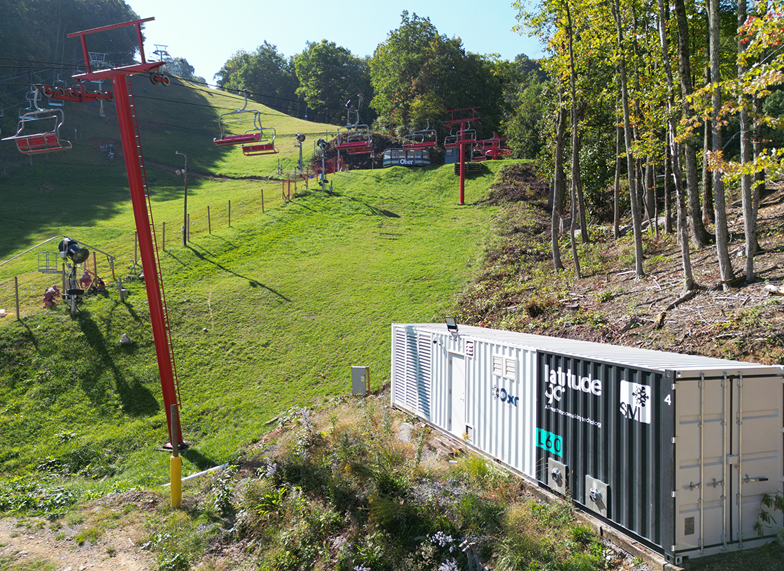 Close-up of a Latitude 90 L-Series machine in summer at Ober Mountain with the ski lift on the left