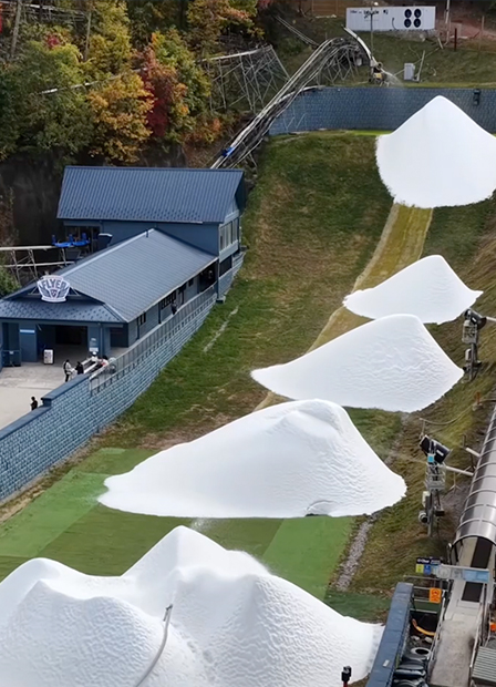Aerial view of Ober Mountain highlighting snow accumulations generated by Latitude 90 units