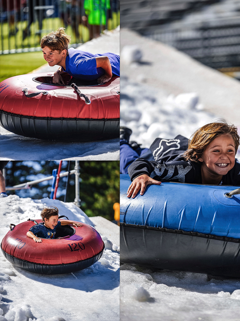Three young boys dressed in summer clothes, seated on tubes, are sliding down snowy slopes.